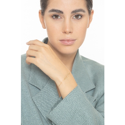 Pulsera en oro amarillo 18 quilates con tres flores 