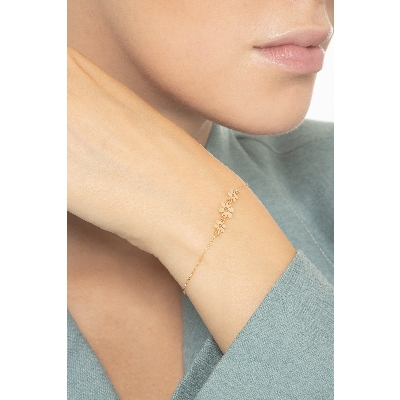Pulsera en oro amarillo 18 quilates con tres flores 