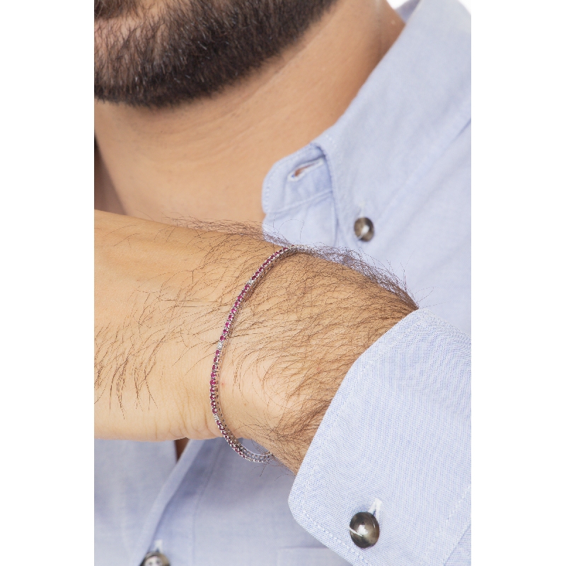 Pulsera tenis a garra en oro blanco 18k con rubíes y diamantes