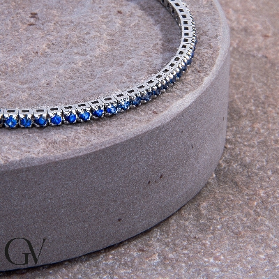 Pulsera en oro blanco 18k Tennis con zafiros azules