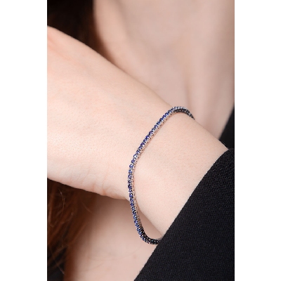 Pulsera en oro blanco 18k Tennis con zafiros azules
