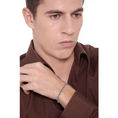 Pulsera Tennis piramidal en oro blanco 18 quilates con zafiros azules