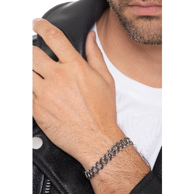 Pulsera cubana de oro blanco 18k con diamantes negros. Puntas brunidas.