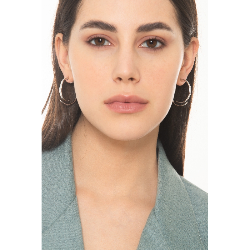 Aros en oro blanco 750 engastados con diamantes  Aros en oro blanco 750 engastados con diamantes