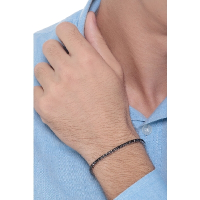 Pulsera Tennis en oro blanco 18k diamantes negros en garras brunidas