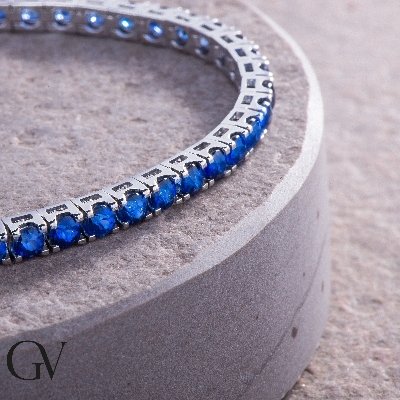 Pulsera tenis oro blanco 18k con zafiros azules