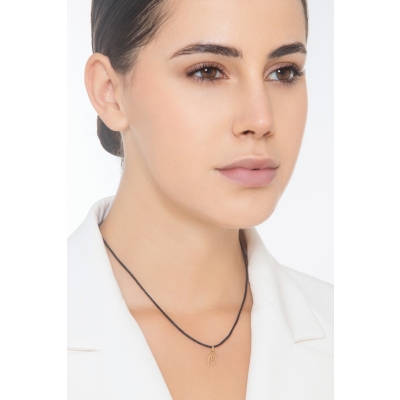 Colgante con inicial Q oro amarillo 18 quilates