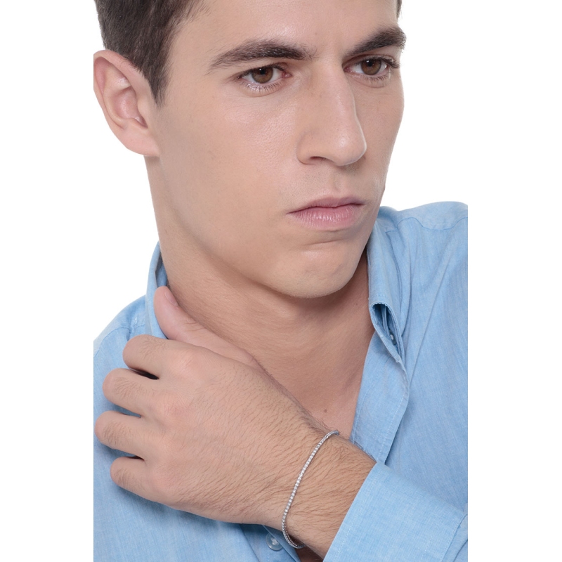 Brazalete tenis con garras en oro blanco 18k con diamantes