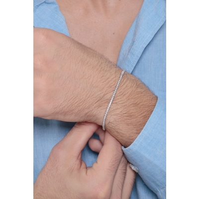 Brazalete tenis con garras en oro blanco 18k con diamantes