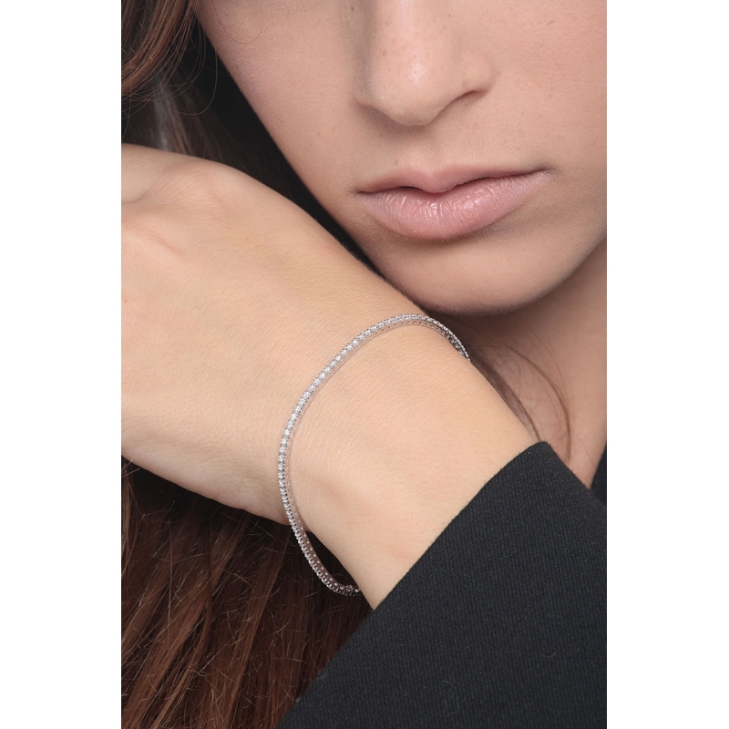 Brazalete tenis con garras en oro blanco 18k con diamantes