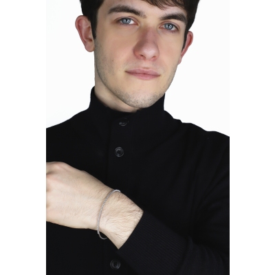 Pulsera rígida en oro blanco de 18 quilates con diamantes