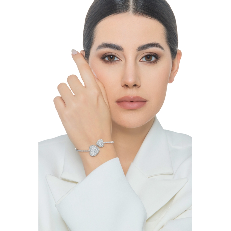 Pulsera de oro blanco 18 qt con dos corazones de diamantes Pulsera de oro blanco 18 qt con dos corazones de diamantes