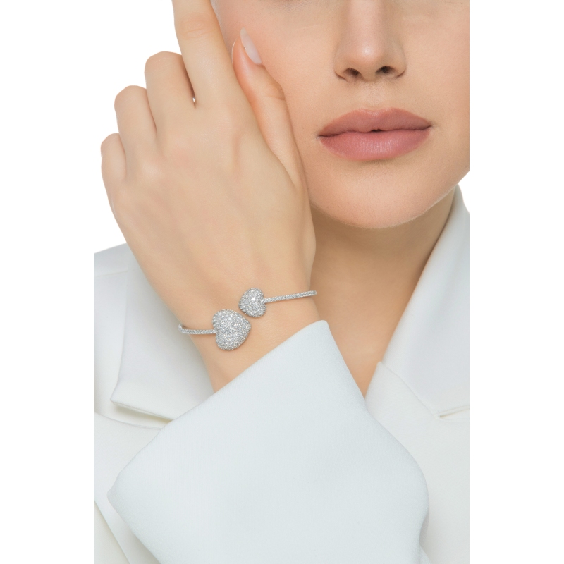 Pulsera de oro blanco 18 qt con dos corazones de diamantes Pulsera de oro blanco 18 qt con dos corazones de diamantes