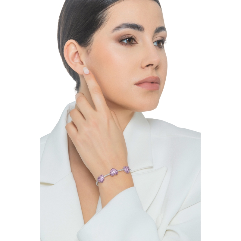 Brazalete en oro blanco 18k con tres corazones en zafiros rosas Brazalete en oro blanco 18k con tres corazones en zafiros rosas