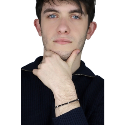 Pulsera Tennis hilo en oro blanco 18k engastada con diamantes negros y diamantes