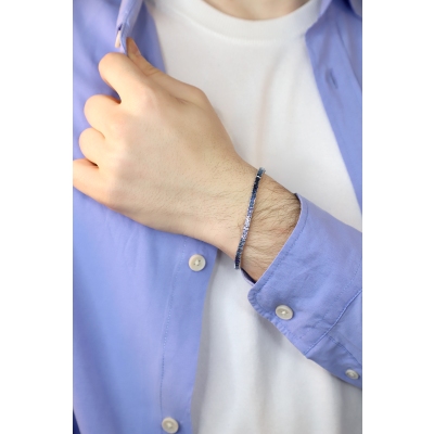 Pulsera Riviera en oro blanco 18 quilates con zafiros azules