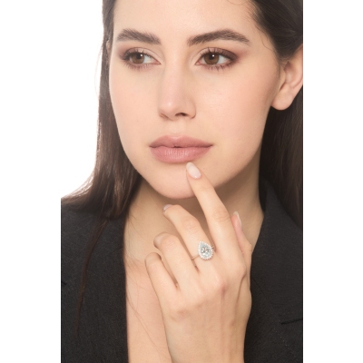 Anillo en oro blanco 18k con aquamarina gota halo diamantes 