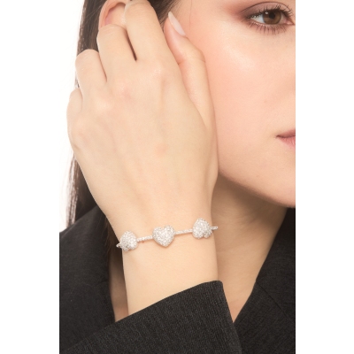 Pulsera de oro blanco y diamantes con tres corazones