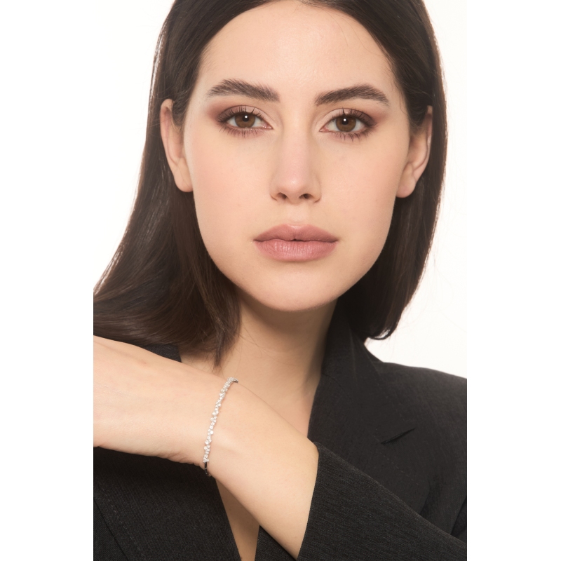 Brazalete en oro blanco 18 quilates hojas y diamantes  Brazalete en oro blanco 18 quilates hojas y diamantes