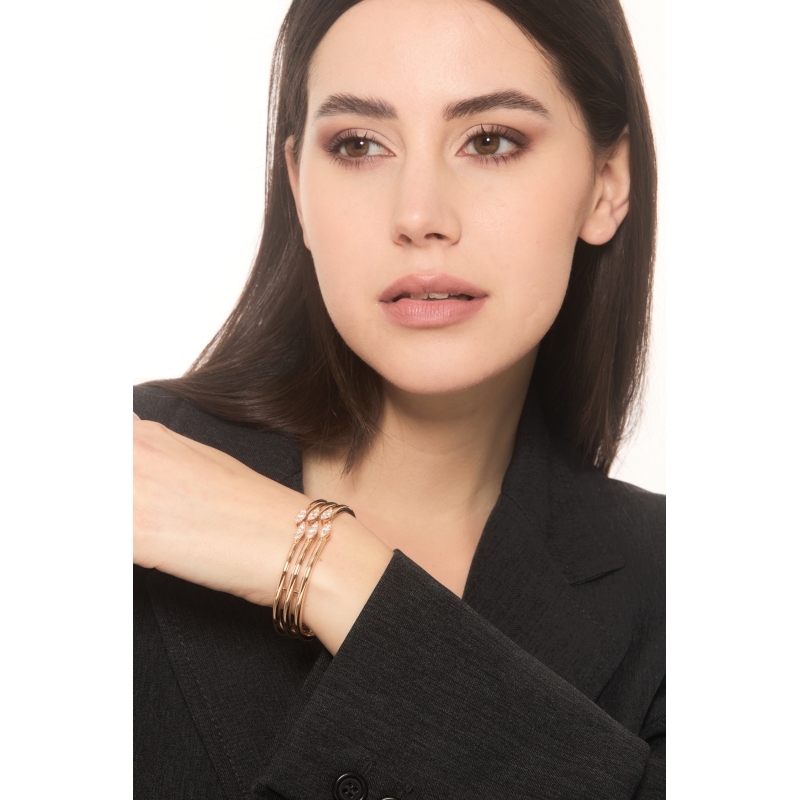 Brazalete de diseño en oro rosa de 18k con diamantes