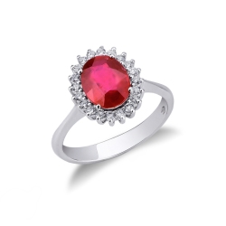 Anillo de compromiso en oro blanco de 18 kilates con rubí y diamantes
