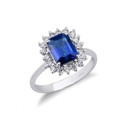 Anillo contorno en oro blanco 18k con zafiro azul y diamantes