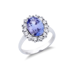 Anillo con halo en oro blanco 18k con tanzanita ovalada y diamantes