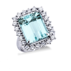 Anillo halo en oro blanco de 18k con diamantes y aguamarina