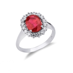 Anillo halo en oro blanco 18k con rubí ovalado y diamantes