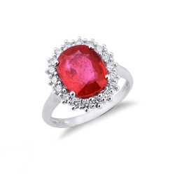 Anillo de compromiso de rubí oval y diamantes oro blanco 18 kilates