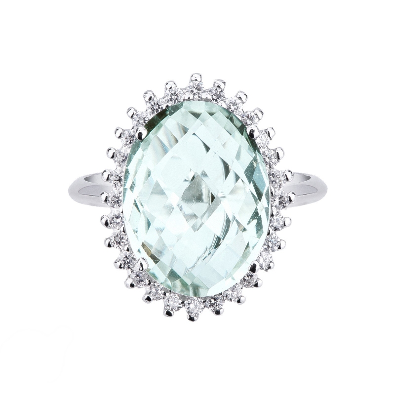 Anillo en oro blanco 18k con topacio azul y diamantes