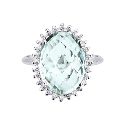 Anillo en oro blanco 18k con topacio azul y diamantes