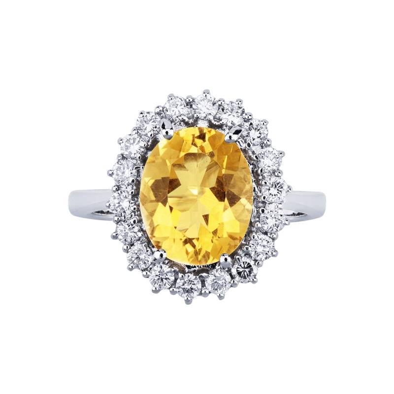Anillo halo en oro blanco 18k con citrino ovalado y diamantes Anillo halo en oro blanco 18k con citrino ovalado y diamantes