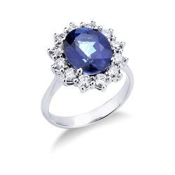Anillo halo en oro blanco de 18 quilates con zafiro azul ovalado y diamantes