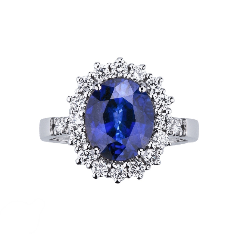 Anillo contorno en oro blanco de 18k con zafiro azul y diamantes Anillo contorno en oro blanco de 18k con zafiro azul y diamantes