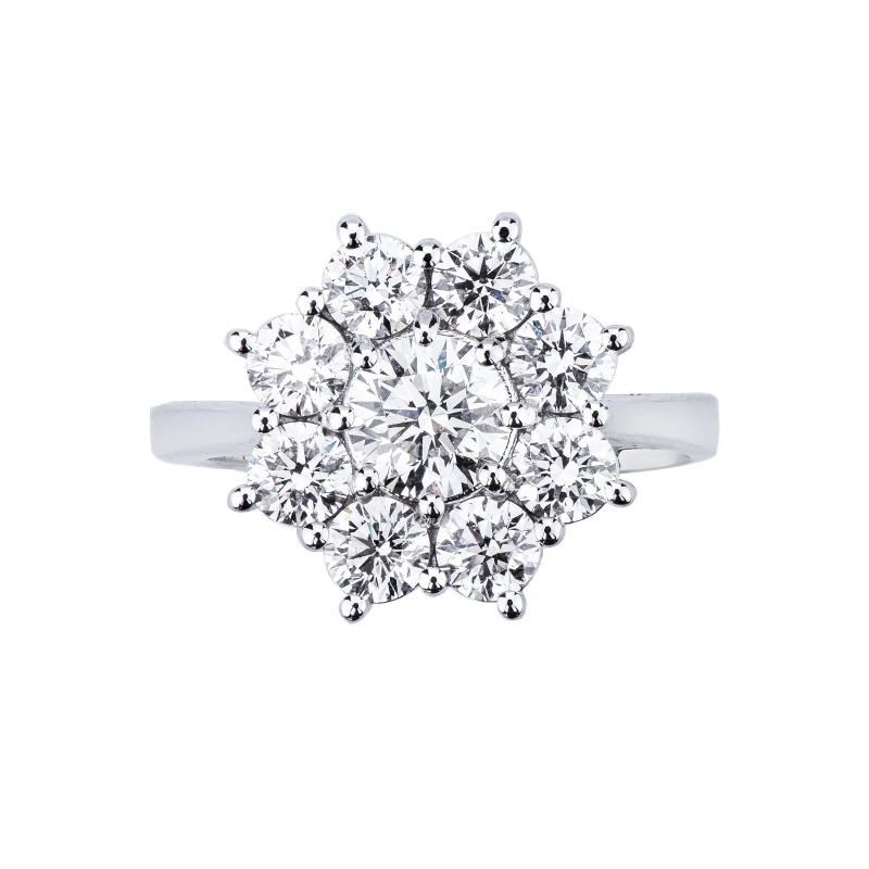 Anillo halo de flor en oro blanco 750 con diamante central CT1.00 Anillo halo de flor en oro blanco 750 con diamante central CT1.00