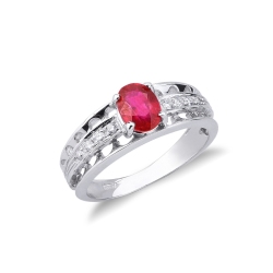 Anillo oro blanco de 18k con un rubí oval y diamantes
