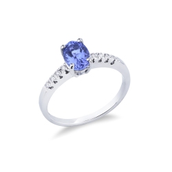 Anillo oro blanco 18 quilates con tanzanita central y diamantes