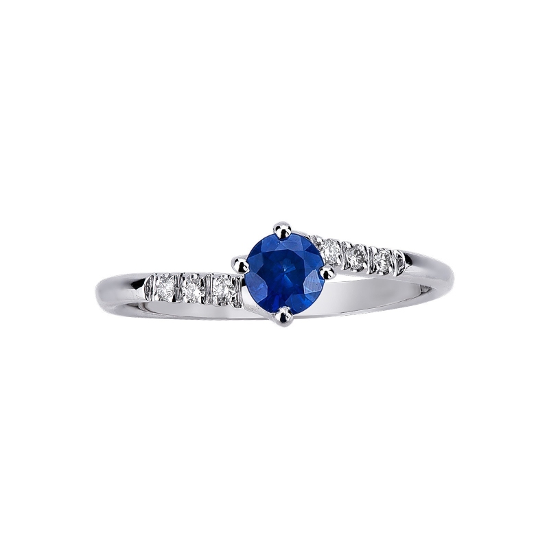 Anillo de oro blanco de 18k con zafiro azul Anillo de oro blanco de 18k con zafiro azul