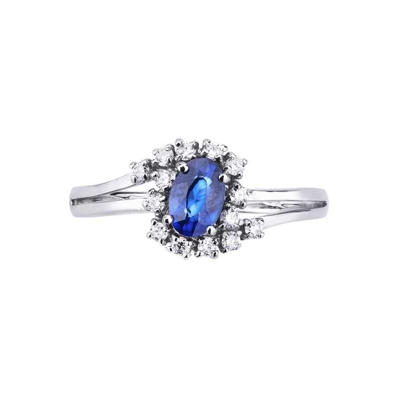 Anillo con diamantes y zafiro azul ovalado central en oro blanco de 18 kilates Anillo con diamantes y zafiro azul ovalado central en oro blanco de 18 kilates