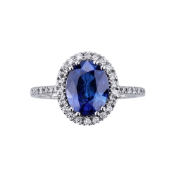 Anillo en oro blanco con zafiro azul ovalado y diamantes 2