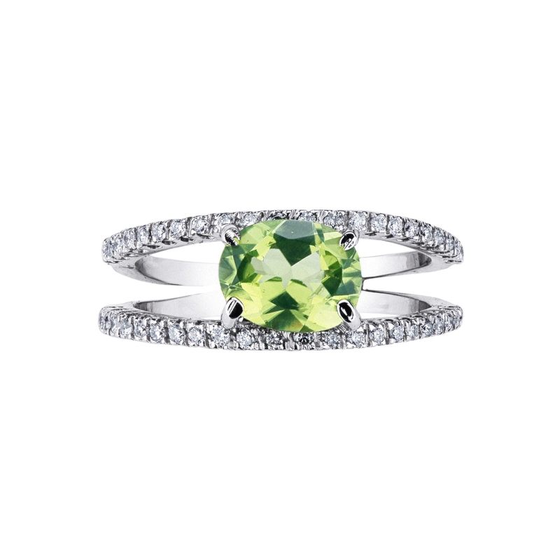 Anillo oro blanco 18k con un peridoto y diamantes