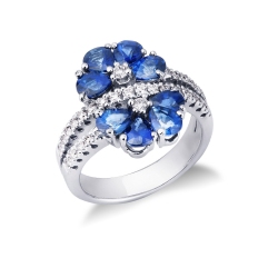Anillo oro blanco 18k con zafiros azules y diamantes estilo pétalos