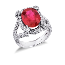 Anillo halo en oro blanco 18k rubí en el centro y diamantes