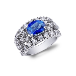 Anillo oro blanco de 18k con zafiro azul central corte ovalado