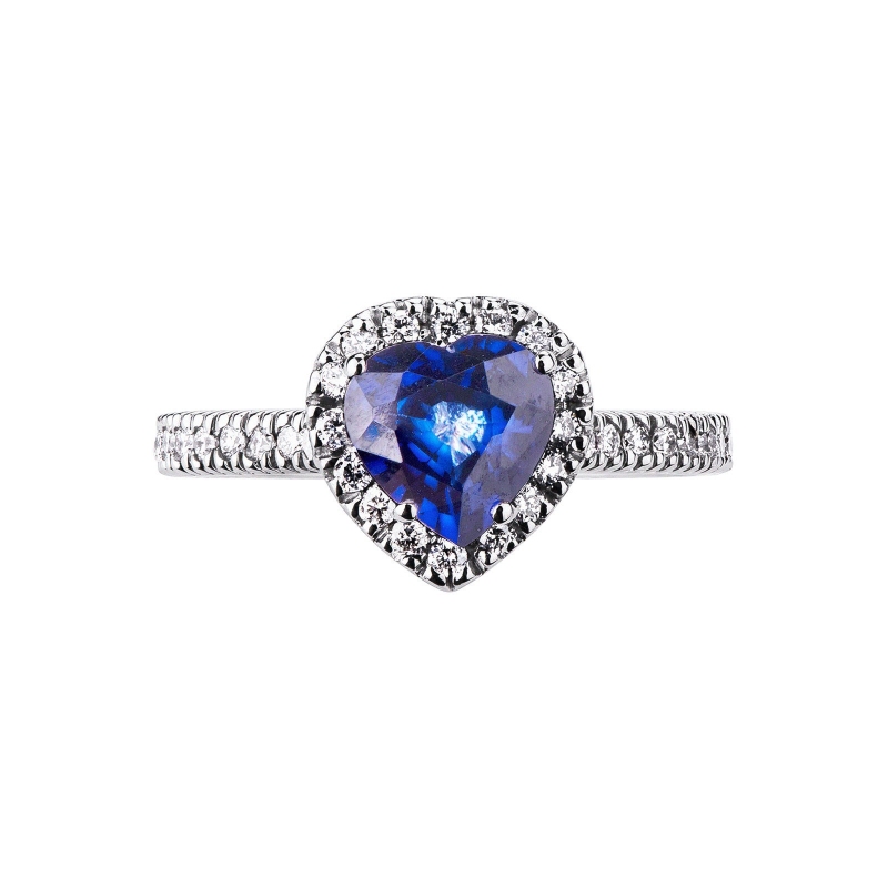 Anillo con zafiro azul en forma de corazón engastado con diamantes oro blanco 18 kilates Anillo con zafiro azul en forma de corazón engastado con diamantes oro blanco 18 kilates