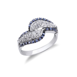 Anillo ondulado en oro blanco 18k con diamantes y zafiros azules