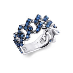 Anillo malla Cuban Link en oro blanco 18k con zafiros azules