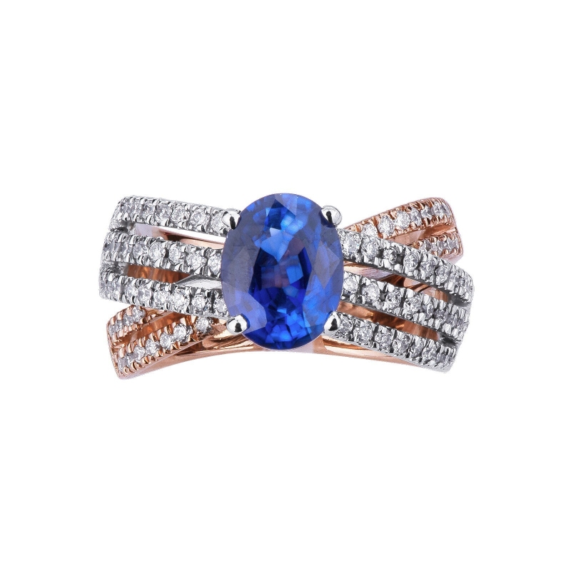 Anillo de banda en oro blanco y rosa con zafiro azul y diamantes Anillo de banda en oro blanco y rosa con zafiro azul y diamantes