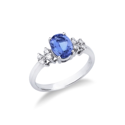 Anillo de oro blanco de 18k con diamantes y tanzanita ovalada
